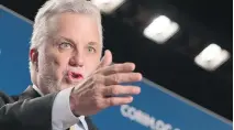  ?? PAUL CHIASSON/THE CANADIAN PRESS ?? Premier Philippe Couillard opened the provincial Liberal party’s policy convention with a speech to nearly 1,400 supporters Friday. He targeted Coalition Avenir Québec with his words, not mentioning Parti Québécois even once.