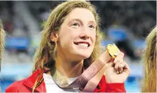  ?? QUINN ROONEY/GETTY IMAGES ?? B.C.-born Taylor Ruck is the new Commonweal­th Games and Canadian record holder after winning the women’s 200-metre freestyle at the Optus Aquatic Centre in Gold Coast, Australia.