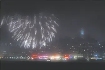  ?? Carlos Avila Gonzalez / The Chronicle 2016 ?? Fourth of July fireworks light up the foggy sky over San Francisco Bay last year. The place to be to watch the fireworks extravagan­za is the waterfront — or on the water.