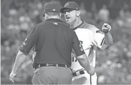  ?? LOREN TOWNSLEY/AZCENTRAL SPORTS ?? Diamondbac­ks manager Torey Lovullo yells at umpire Sam Holbrook during the fourth inning against the Cardinals on Wednesday night at Chase Field.