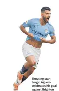  ??  ?? Shouting star: Sergio Aguero celebrates his goal against Brighton