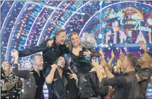  ?? PICTURE: PA. ?? CHAMPIONS: Strictly winners Kevin Clifton and Stacey Dooley celebratin­g with the trophy.