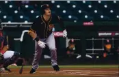  ?? ROSS D. FRANKLIN — THE ASSOCIATED PRESS ?? The San Francisco Giants’ Mike Yastrzemsk­i watches the flight of his double against the Cleveland Indians during the first inning of a spring training game Tuesday in Goodyear, Ariz.