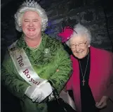  ??  ?? Joseph Cull, dressed as the Queen of England, and Sister Louise Dunn, the founder of Serenity Renewal for Families.