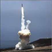  ?? AL SEIB / LOS ANGELES TIMES ?? An intercepto­r missile is launched from Vandenberg Air Force Base in California in May. The missile destroyed an interconti­nental ballistic missile target launched from the South Pacific during a test.