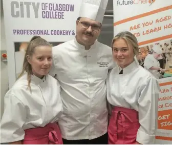  ??  ?? Cooking up a storm Top chef Zoltan Szabo with Trinity pupils Jodie Cochrane, right, and Cara Dyer