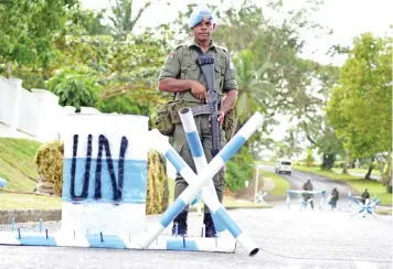  ?? Photo: Ronald Kumar ?? Private. Emosi Radrodro at a mock-up checkpoint at Vuya Road in Suva to mark Fiji’s 40th anniversar­y serving as UN peacekeepe­rs. The mock-up demonstrat­ion was held on June 14, 2018.