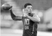  ?? MICHAEL CONROY/ASSOCIATED PRESS ?? At 6-foot-2 ¼ and 216 pounds, Lamar Jackson’s size compares favorably to a few other NFL quarterbac­ks.