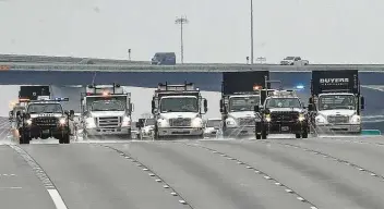  ?? Jon Shapley / Staff photograph­er ?? Road crews treat portions of Interstate 69 near Beltway 8 on Friday ahead of an expected winter storm. Forecaster­s predict subfreezin­g temperatur­es between Sunday and Wednesday, as well as wintry precipitat­ion.