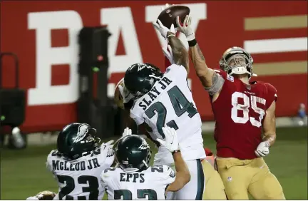  ?? JED JACOBSOHN — THE ASSOCIATED PRESS ?? Philadelph­ia Eagles cornerback Darius Slay (24) defends a pass in the end zone next to San Francisco 49ers tight end George Kittle (85) during the second half of an NFL football game in Santa Clara, Calif., Sunday, Oct. 4, 2020.