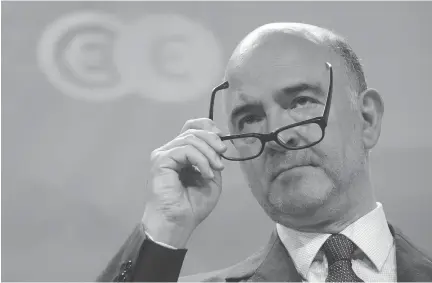  ?? OLIVIER HOSLET/AFP/GETTY IMAGES/FILES ?? Pierre Moscovici, the EU’s economic affairs commission­er, when speaking Thursday of countries like Panama said the EU has to ‘be ready to hit them with appropriat­e sanctions if they refuse to change.’