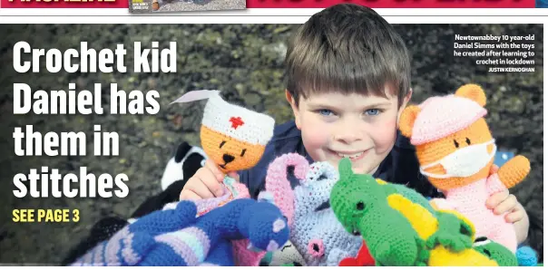  ?? JUSTIN KERNOGHAN ?? Newtownabb­ey 10 year-old Daniel Simms with the toys he created after learning to
crochet in lockdown