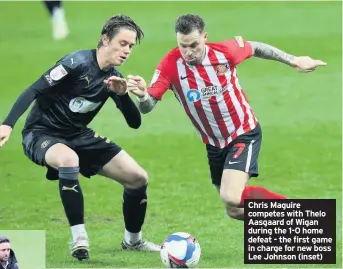  ??  ?? Chris Maguire competes with Thelo Aasgaard of Wigan during the 1-0 home defeat - the first game in charge for new boss Lee Johnson (inset)