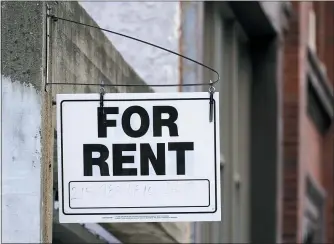  ?? ASSOCIATED PRESS FILE PHOTO ?? A “For Rent” sign is posted on a building in Philadelph­ia. The federal rental assistance is running out in some places, which is putting pressure on the U.S. Treasury Department to shift remaining funds to the states and cities most in need. Treasury has shifted more than $2 billion mostly to states and cities with a higher concentrat­ion of renters and away from small, mostly rural states.