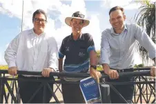  ??  ?? Politician­s George Christense­n (left), Matt Canavan (right) and Bowen Collinsvil­le Enterprise’s Paul Mclaughlin discuss the dam.