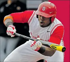  ?? DISPATCH ?? KYLE ROBERTSON Ronnie Dawson of Ohio State attempts to bunt against Northweste­rn. He went 1 for 5.