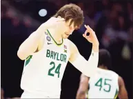  ?? Tim Nwachukwu / Getty Images ?? Baylor’s Matthew Mayer reacts against Houston during the Final Four at Lucas Oil Stadium in Indianapol­is on Saturday.