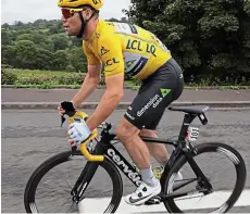  ?? AFP ?? Leader of the pack: Cavendish in the yellow jersey