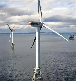  ??  ?? Turbines installed as part of SSE’s Beatrice demonstrat­or project. Perth-based SSE is a co-venturer on the Seagreen windfarm project which is stalled by a court challenge.