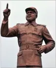  ?? PICTURE: ELMOND JIYAME ?? REVOLUTION­ARY: A bronze sculpture of Machel stands in Independen­ce Square in Maputo, Mozambique.