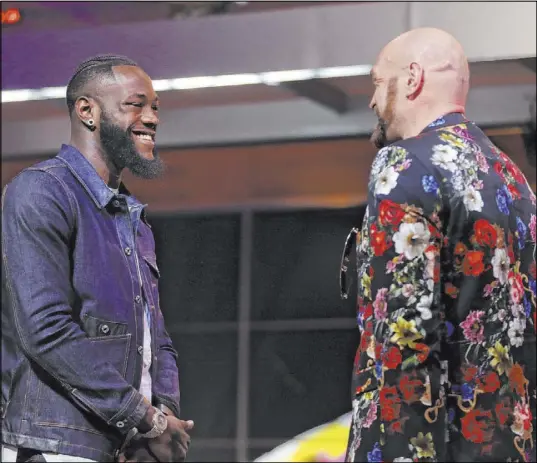  ?? Erik Verduzco Las Vegas Review-Journal @Erik_Verduzco ?? Heavyweigh­ts Deontay Wilder, left, and Tyson Fury face off during a news conference at Fox Studios in Los Angeles on Saturday.