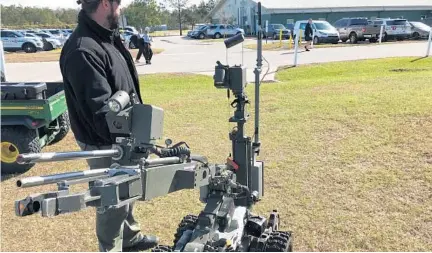  ?? JOE MARIO PEDERSEN/ORLANDO SENTINEL ?? An OCSO robot capable of explosive ordinance disposal and disarming improvised explosive devices.