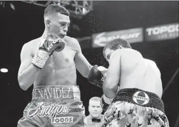  ?? Steve Marcus Getty Images ?? DAVID BENAVIDEZ has risen to WBC super-middleweig­ht champion at age 21 and learned from older brother Jose Jr. “He’s given me a lot of knowledge. He led the way for me, passed the torch to me,” David says.