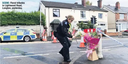  ??  ?? SCENE: Floral tributes in Lightwood Road, Longton, yesterday.