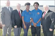  ?? SUBMITTED PHOTO ?? Michael O’Grady, left, Holland College’s vice-president of innovation, enterprise and strategic developmen­t, joins MLA Gerard Greenan, students Clatira Almir and G’Niyo Stuart and Bruce MacDougall, deputy mayor of the City of Summerside, at the...