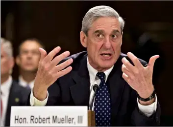  ??  ?? In this 2013 file photo, then-FBI Director Robert Mueller testifies on Capitol Hill in Washington. When special counsel Mueller testifies before Congress it will be a moment many have been waiting for, but it comes with risk for Democrats.
AP Photo/J. Scott APPlewhIte