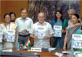  ?? — PTI ?? L- G Anil Baijal, Delhi police commission­er Amulya Patnaik and others release Delhi Study Group’s report on Women’s Safety of Delhi government in New Delhi on Friday.