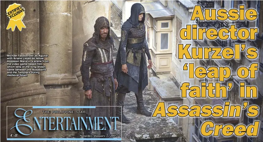  ??  ?? Michael Fassbender as Aguilar with Ariane Lebad as fellow Assassin Maria in a scene from the video game-based film, which tells of the long-drawn battle between the Assassins and the Templars during medieval Spain