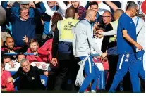  ??  ?? Hot seat: Mourinho is now agitated and leaps from the bench as Ianni heads for the tunnel GETTY IMAGES