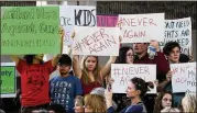  ?? MIKE STOCKER / SUN SENTINEL ?? Students rally in Fort Lauderdale, Fla., for government action on firearms. A national school walkout is planned for Wednesday.