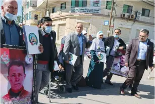  ?? (Mohammed Salem/Reuters) ?? KHALIL AL-HAYYA, Hamas’s deputy leader in Gaza, arrives with other representa­tives to register Hamas’s list for the upcoming Palestinia­n Authority parliament­ary elections, in Gaza City last month.