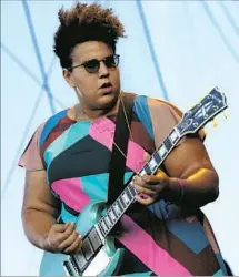  ??  ?? BRITTANY HOWARD of the roots rock band Alabama Shakes adds a little spark to Day 1 of the festival near the Rose Bowl.