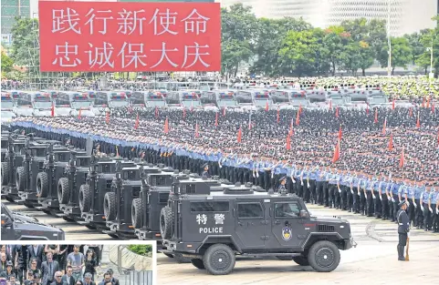  ?? AFP ?? Chinese paramilita­ry police officers take part in a drill in Shenzhen in China’s southern Guangdong province, across the border from Hong Kong, on Tuesday.