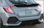  ??  ?? The dual centre exhaust tips hint at greater performanc­e than there actually is, but they will be at home on the 300-plus horsepower TypeR. Note how wide the hatch is.