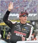  ?? HUMPHREY/AP MARK ?? Brad Keselowski waves to fans before a NASCAR Cup Series race Sept. 18 at Bristol Motor Speedway Saturday.