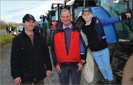  ?? Declan Malone Photo by ?? John Griffin (centre) with PJ Griffin and his son, Stephen, at the start of the West Kerry Charity Tractor Run in Lios Póil on Sunday.