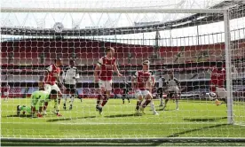  ?? Photograph: Ian Walton/Reuters ?? Eddie Nketiah prods home from close range to salvage a point for Arsenal and break Fulham hearts at the Emirates.