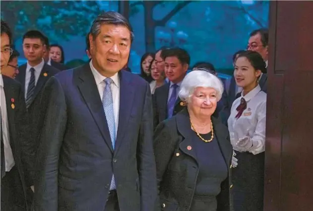  ?? ANDY WONG/POOL ?? Chinese Vice Premier He Lifeng and U.S. Treasury Secretary Janet Yellen arrive for a bilateral meeting Saturday in China’s southern province of Guangdong.