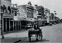  ?? ?? Above: Coleman Place, looking north towards The Square and Coleman St, circa 1925. The remains of the post are difficult to identify.