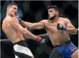  ?? GETTY IMAGES ?? Kelvin Gastelum, right in action against Chris Weidman, is aiming to state his case for a title shot at UFC 244 in New York.