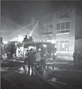  ?? Arkansas Democrat-Gazette/KENNETH HEARD ?? Jonesboro firefighte­rs work a structure fire Friday at 411 S. Union St. in the downtown area. No injuries were reported.