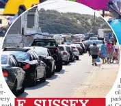  ??  ?? E. SUSSEX
Queue as folk head to Camber Sands