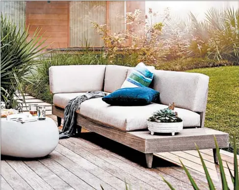  ?? WEST ELM PHOTOS ?? West Elm’s Portside Outdoor low sectional anchors your space, $975, westelm.com