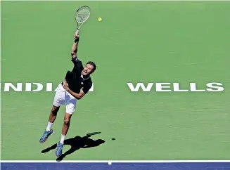  ?? | MATTHEW STOCKMAN AFP ?? DANIIL Medvedev of Russia serves to Gael Monfils of France during the BNP Paribas Open at the Indian Wells Tennis Garden on Monday.