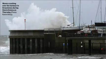  ??  ?? Waves crashing over the harbour in Greystones during Storm Emma on Thursday