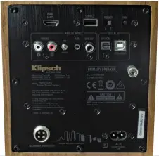  ??  ?? The comprehens­ive set of inputs on the primary speaker includes HDMI ARC, phono/line (switchable), 3.5mm stereo analog, optical digital, and USB. A sub output lets you connect an external subwoofer. The 4-pin connector at the bottom right (left, when viewed from this angle) connects the primary speaker to the secondary speaker using the included cable.